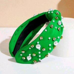 Green headband with pearls and stones